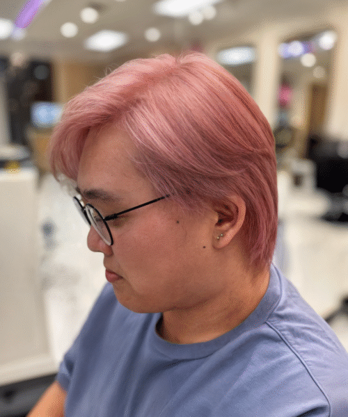 Vibrant pink hair color in Texas salon - Arianna Hair Boutique